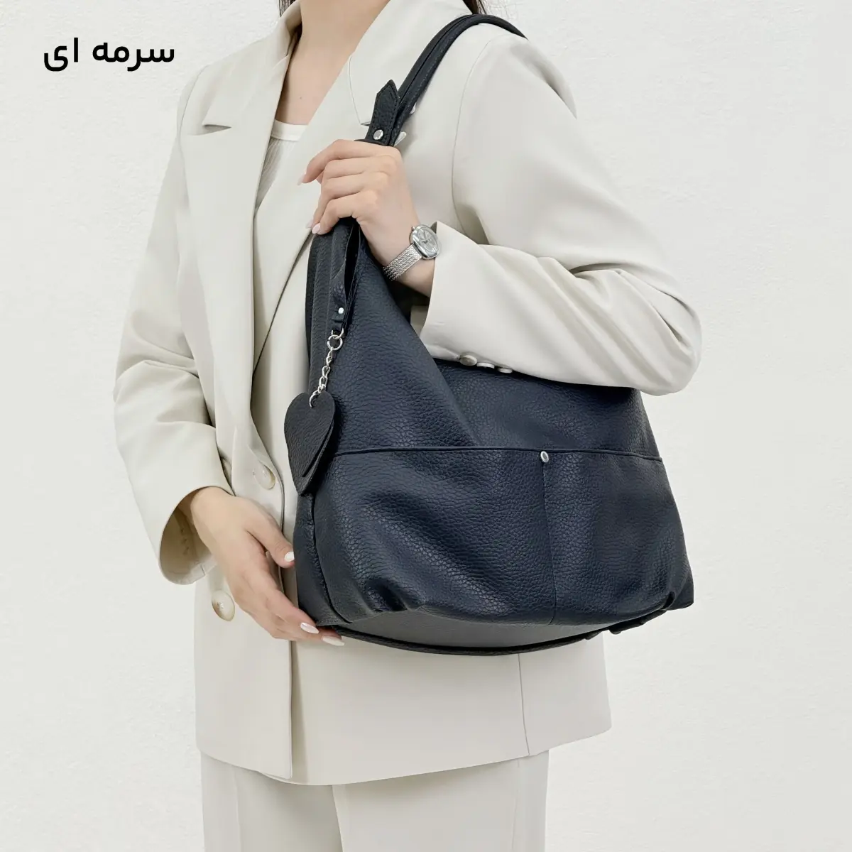 کیف زنانه چرم آویز قلبی